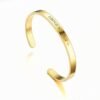 Pulsera personalizada acero quirúrgico dorada grabada por Kregalar